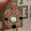 Gold Plated Necklace Set With jade champion Zircons and hanging Pearls.