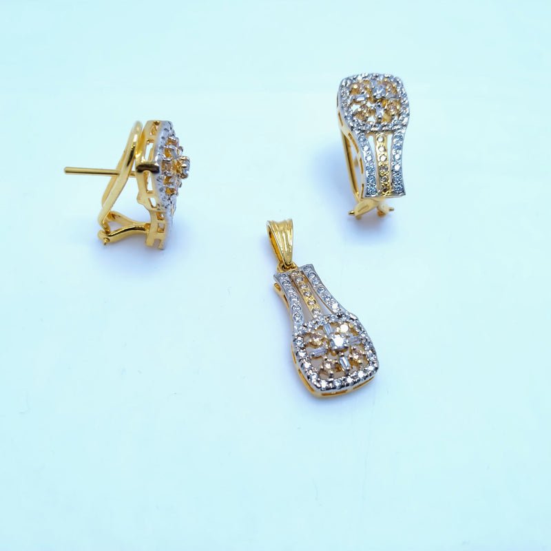 silver pendant set with zircons and gold plated.